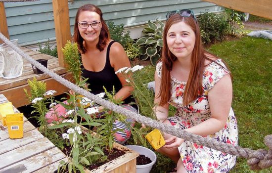 Karyn and Olivia getting started on our pollinator garden!