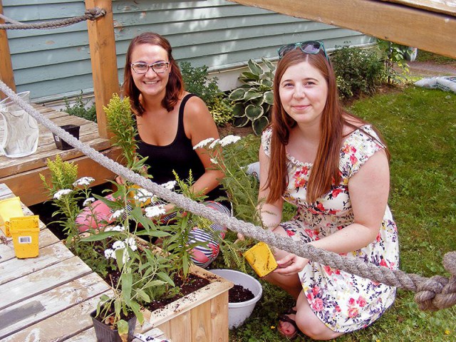 Karyn and Olivia getting started on our pollinator garden!