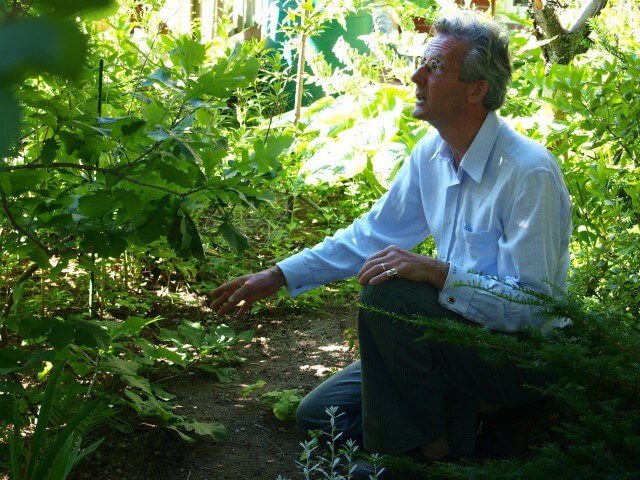 David Smith showing us the wonderful native plant species in his front yard.