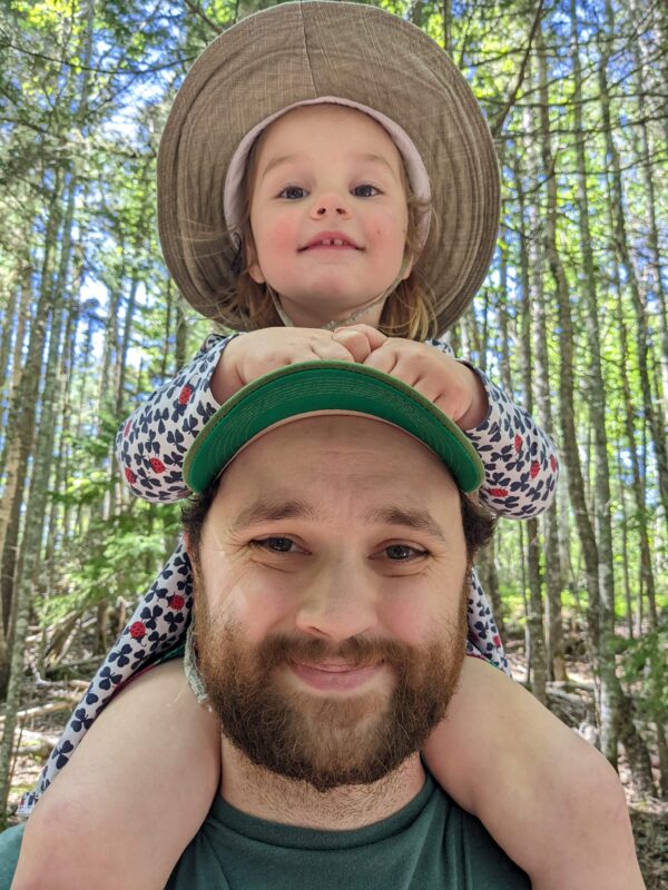 Adam Mahoney and his daughter walking along the Hopewell Trails, Hopewell Rocks Provincial Park